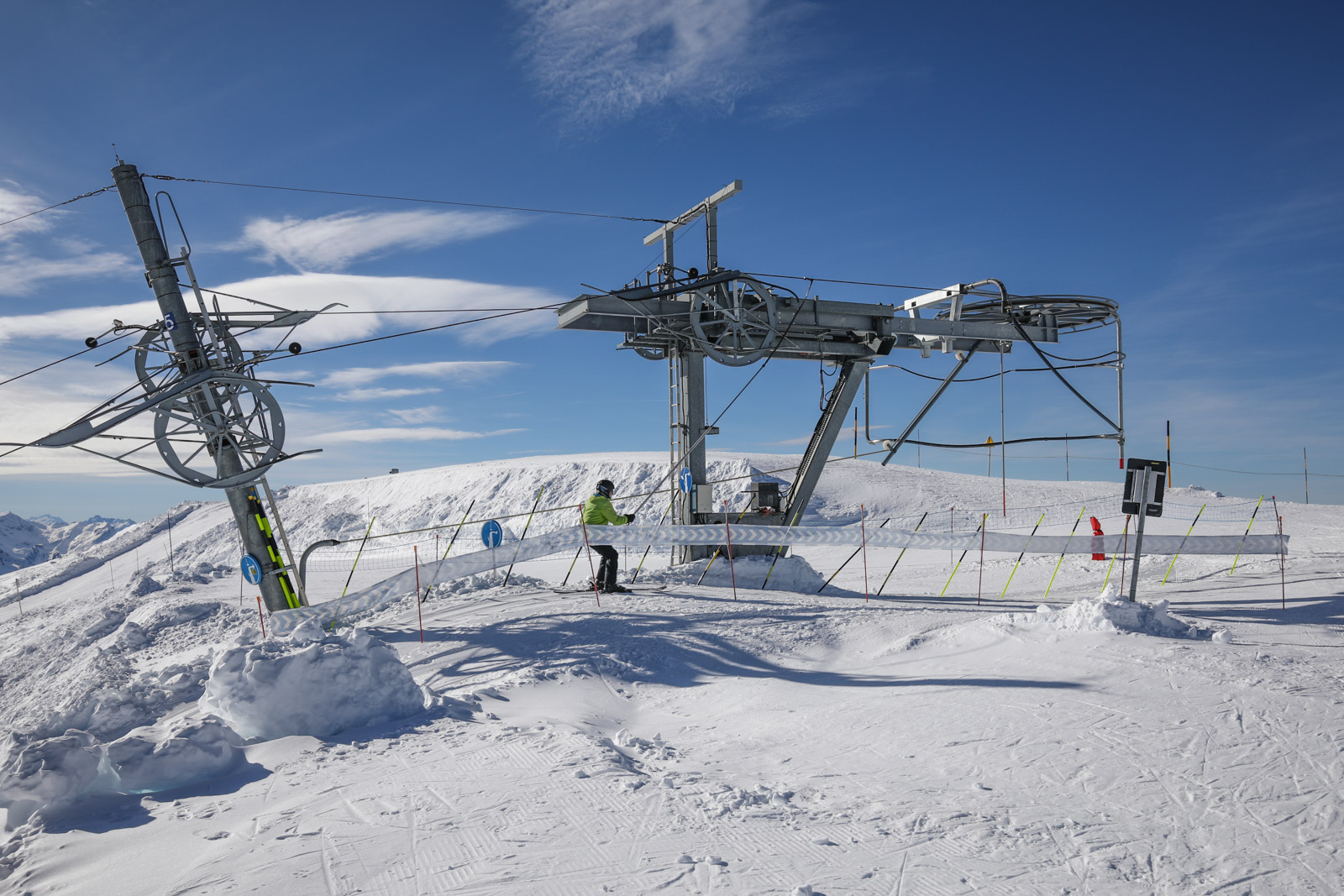 Skier arriving at the top of the Veleray drag lift  